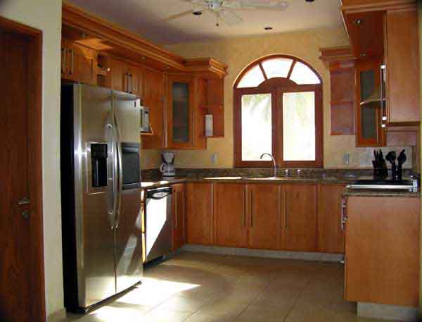 Sunny well-equipped kitchen, granite countertops