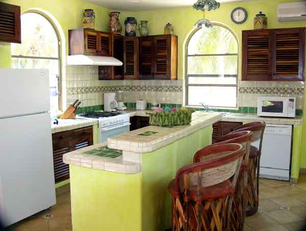Traditional talavera tiled baths and kitchen